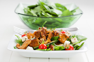 Image showing Spinach salad with roasted chanterelle mushrooms