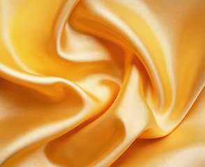 Image showing Smooth elegant golden silk as background 