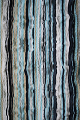 Image showing Blue, white, beige and black strips fabric background