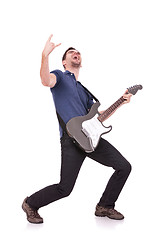 Image showing guitarist making a rock and roll gesture