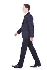 Image showing  business man walking forward 