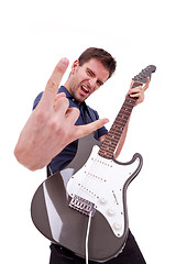 Image showing rockstar holding an electric guitar