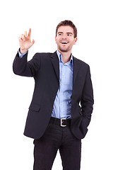 Image showing business man pushing imaginary buttons 