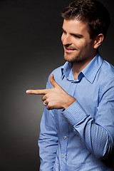 Image showing man presenting or pointing