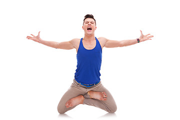 Image showing screaming man  in a zen position