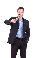 Image showing business man touching imaginary screen