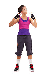 Image showing sporty woman gesturing a  win symbol 