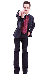 Image showing young business man in suit pointing at you 