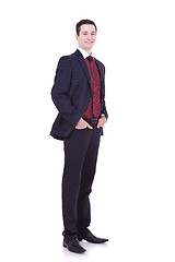 Image showing  business man standing with hands in pocket