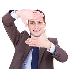 Image showing executive making frame with his hands