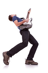Image showing wide angle of a young guitarist