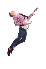 Image showing passionate guitarist jumps in the air