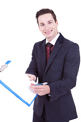 Image showing business man showing blank clipboard