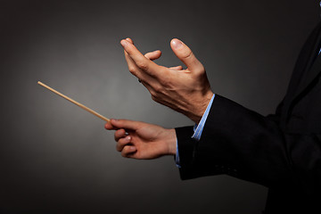 Image showing male music conductor directing 