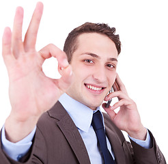 Image showing approving the good news on the phone