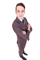 Image showing confident businessman with his hands crossed