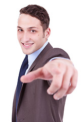 Image showing business man points finger at you