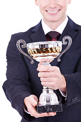 Image showing man handing a trophy ove