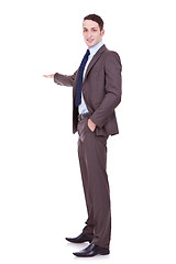 Image showing Full length of successful business man presenting