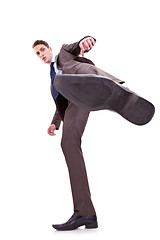 Image showing kicking business man