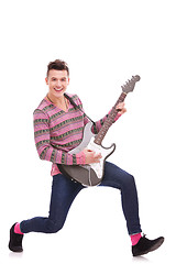 Image showing Guitarist Playing six-string electric guitar