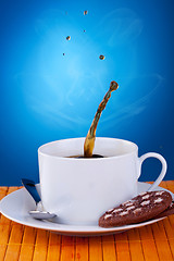 Image showing splash in a cup of coffee