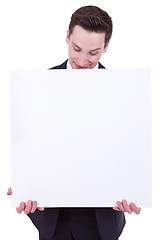 Image showing business man showing blank signboard