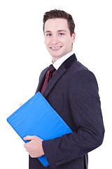 Image showing Business man holding clipboard