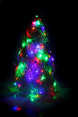 Image showing christmas tree form the color xmas lights