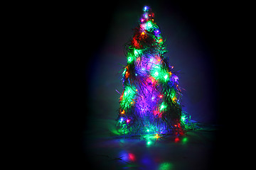 Image showing christmas tree form the color xmas lights