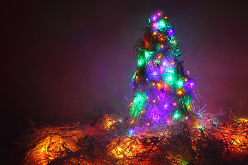 Image showing christmas tree form the color xmas lights