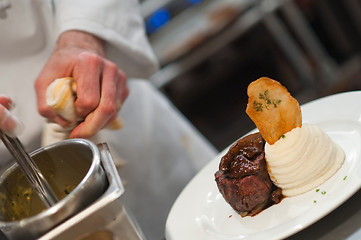 Image showing Preparing steak