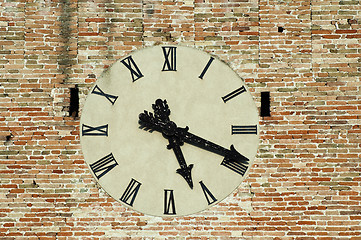 Image showing Antique clock on a building.