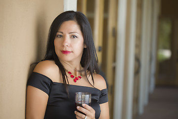 Image showing Attractive Hispanic Woman Portrait Outside Enjoying Wine