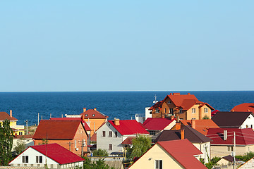Image showing Colored roofs at the seashore