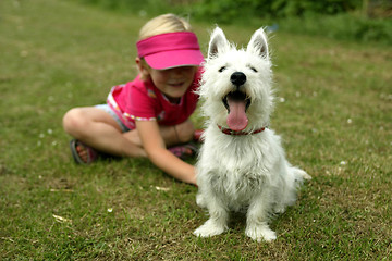 Image showing Dog and Young Owner