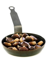 Image showing Chestnuts roasting in a pan.