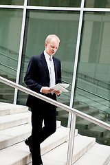 Image showing succsessful business man with tie and black dress 