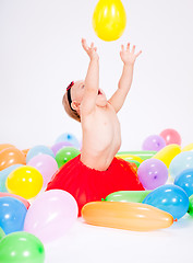 Image showing cute little baby child with colorfull balloons birthday