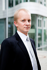 Image showing succsessful business man with tie and black dress 