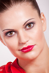 Image showing beautiful brunette woman with red lips and makeup