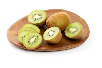 Image showing Kiwi on Wooden Plate