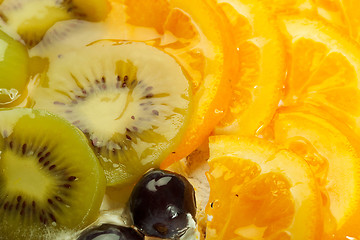 Image showing kiwi, grapes and orange topping