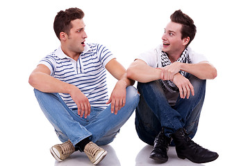 Image showing two men friends looking one at the other