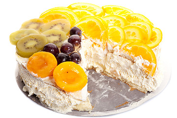 Image showing fruity cake with a piece missing