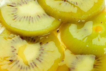 Image showing  fruity cake topping made of kiwi slices