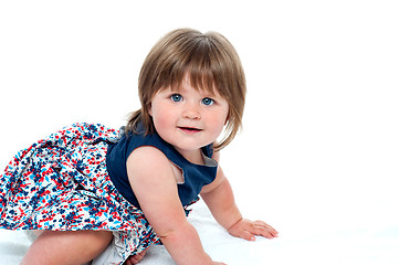 Image showing Cute little baby girl crawling