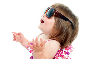 Image showing Baby girl wearing over sized sunglasses