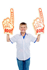 Image showing Energetic young boy showing true fan spirit