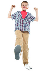 Image showing Enthusiastic child enjoying himself